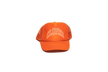 Load image into Gallery viewer, Orange Mesh trucker hat with Cloned embroidered in white collegiate letters in an Arc across the front panels, front view.