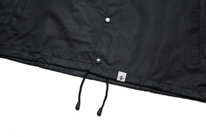 Coach Jacket with White Logo, Black, Front View of the bottom hem tag, waist draw string and buttons.