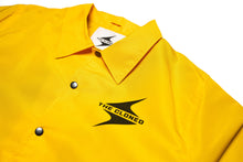 Load image into Gallery viewer, Yellow coach Jacket with Black Logo,  Front View of the collar and logo